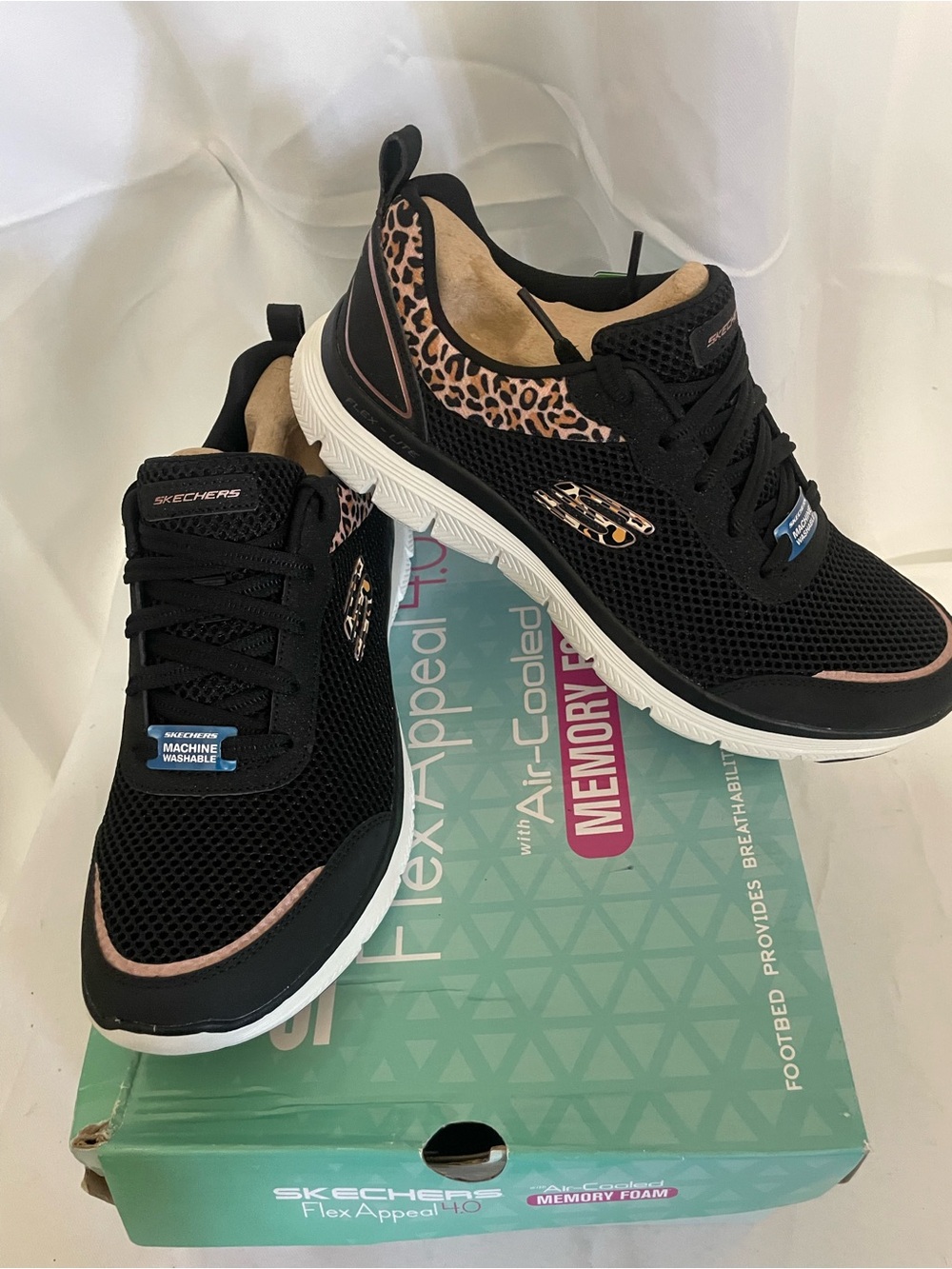 Skechers Women’s Black Athletic Sneakers with Leopard Trim